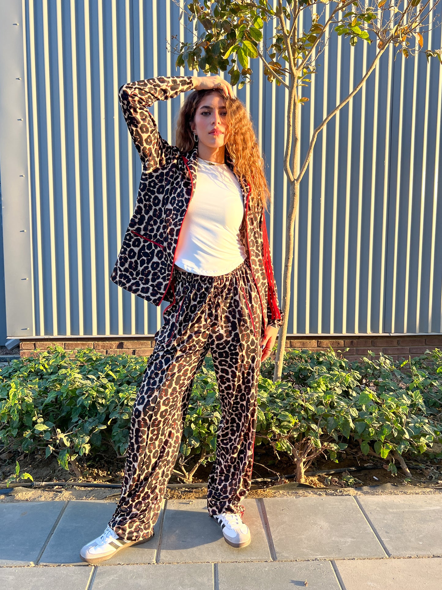 LEOPARD PANTS WITH TOUCH OF RED