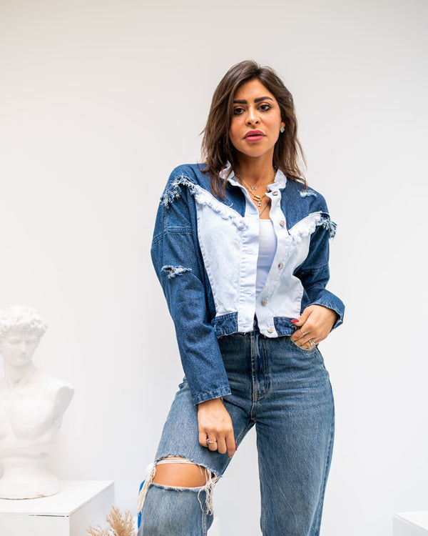 Stylish V-cut women's denim jacket by Aya Osama Couture, perfect for casual wear and trendy Egyptian fashion.