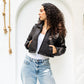 Black waterproof cropped jacket by Aya Osama Couture, stylish and trendy women's outerwear, perfect for fashion-forward looks.