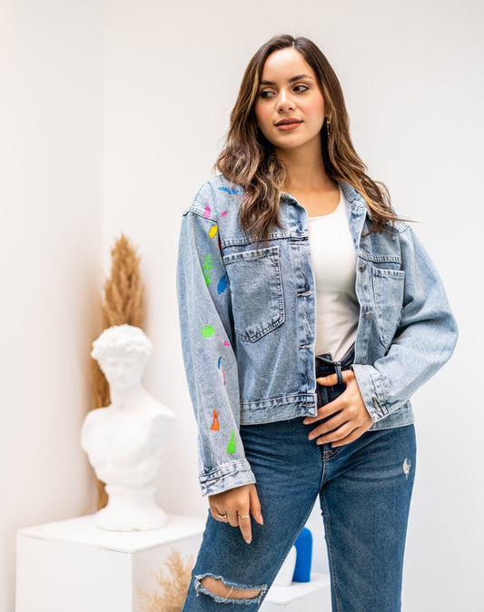 Women's blue denim jacket by Aya Osama Couture, lightweight and stylish, perfect for casual wear in spring and fall. Made in Egypt.