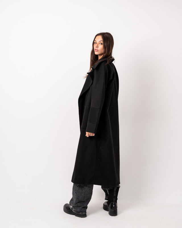 Black oversized wool blend coat by Aya Osama Couture, featuring a stylish and warm design perfect for winter fashion.