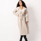 Elegant beige oversized wool blend coat by Aya Osama Couture, perfect for winter; stylish, warm, and luxurious women's fashion coat.