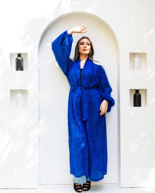 Elegant blue satin cardigan with glitz shoulder details by Aya Osama Couture, perfect for evening wear and formal occasions.