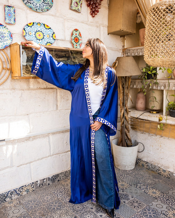 Elegant blue satin cardigan with handmade embroidery by Aya Osama Couture, perfect for high-end fashion and luxury women's tops.