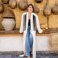 White pure linen cardigan with handmade embroidery by Aya Osama Couture, featuring elegant lila fringes. Luxury women's fashion top.