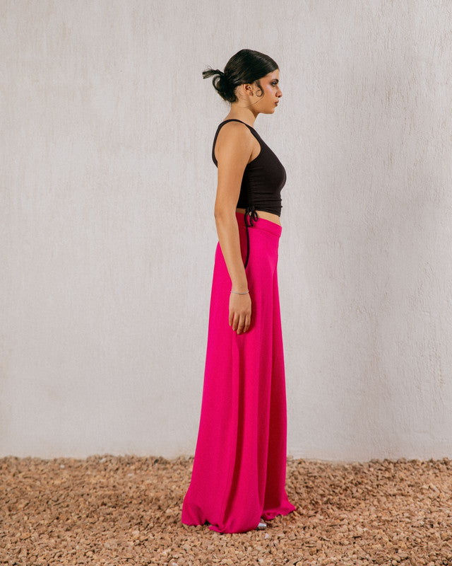 Hot pink flowy pants by Aya Osama Couture, lightweight and breathable CY fabric, perfect for stylish and comfortable summer wear.