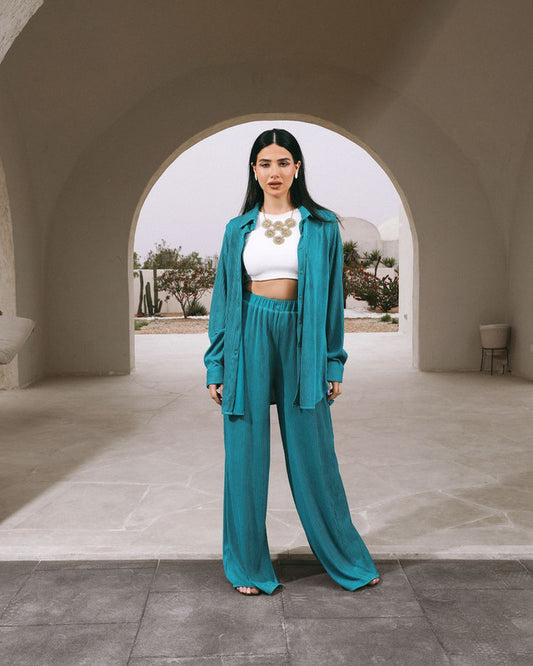 Turquoise pleated shirt set for women by Aya Osama Couture, elegant and stylish, perfect for trendy and comfortable fashion.