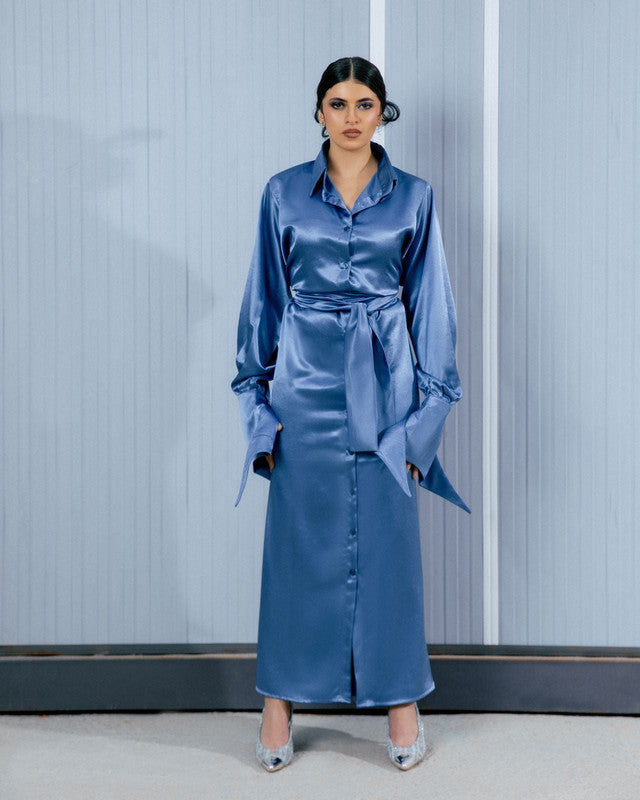 Elegant blue satin modesty shimmer dress by Aya Osama Couture, perfect for formal evening wear and modest fashion.