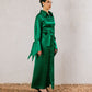 Green satin modest shimmer dress with sleeves by Aya Osama Couture, perfect for evening parties and formal events.
