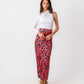 Elegant pink satin wrapped skirt by Aya Osama Couture, perfect for luxury fashion and stylish women's apparel.