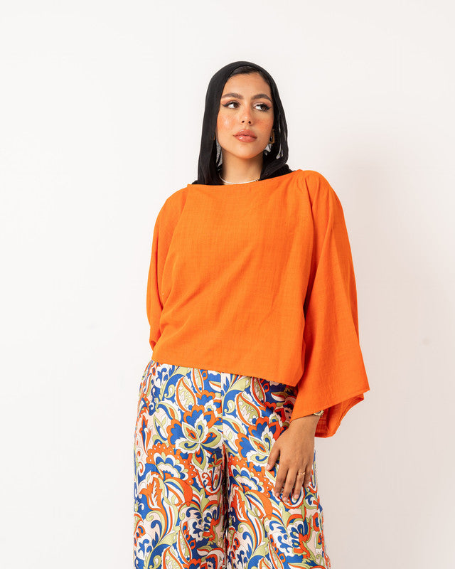 Orange short sleeve linen top for women by Aya Osama Couture, perfect for summer; breathable, lightweight, and stylish Egyptian fashion.